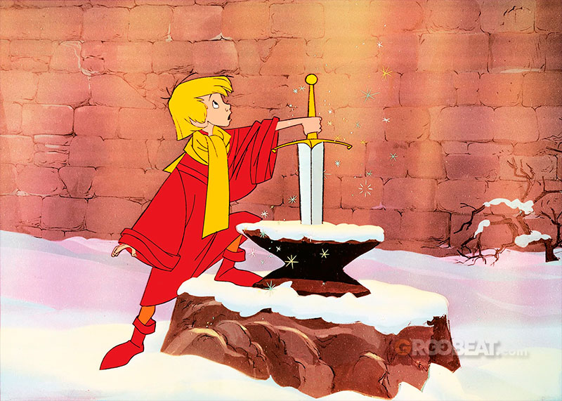 Arturo sosteniendo la espada clavada en la piedra.