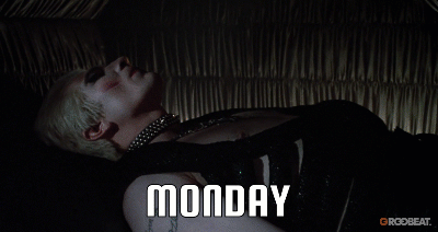 a vampire sleeps peacefully in a coffin and wakes up suddenly, caption says “MONDAY”