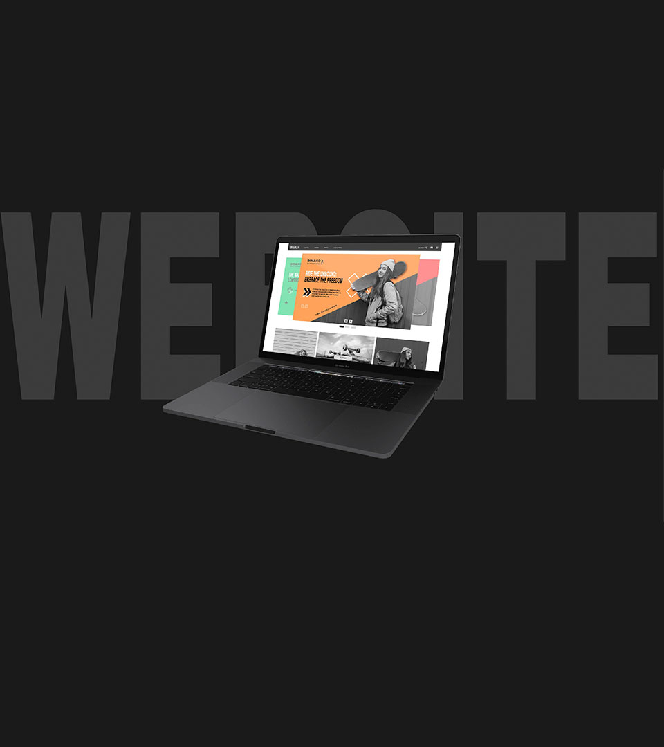 Website mockup seen on a laptop.